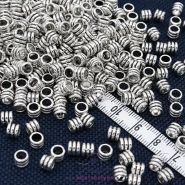 خرجکار دستبند فلزی طرحدار نقره ای (10 عددی)