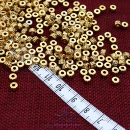 خرجکار دستبند فلزی طرحدار تراش خورده طلایی (10 عددی)
