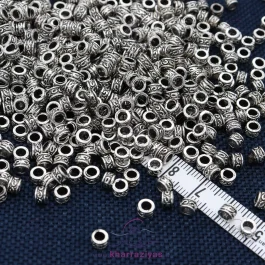 خرجکار دستبند فلزی طرحدار نقره ای (10 عددی)